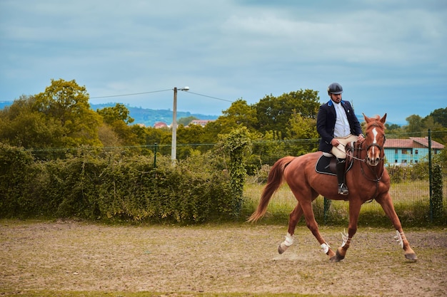 Darkhaired jockey jogging and preparing for an obstacle race with copy space