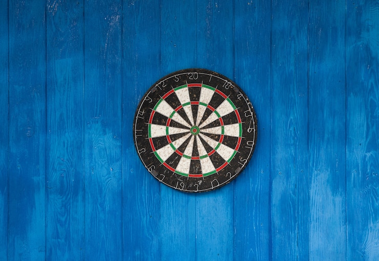 Photo dart board on a wooden wall