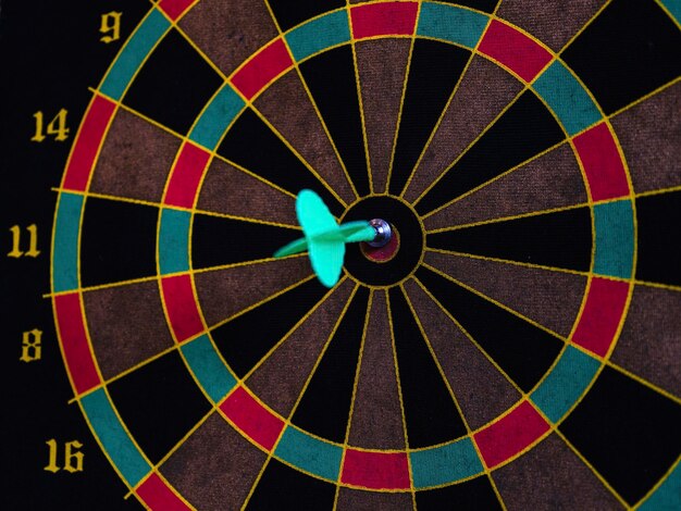 Dart game and an arrow right in the middle