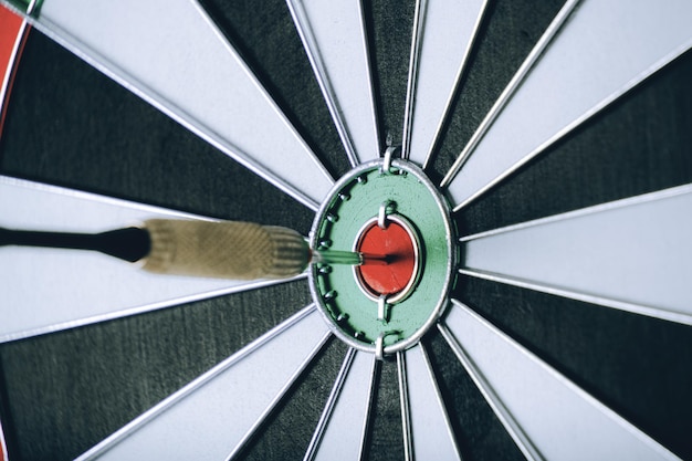 Photo dart for playing darts hitting exactly center target