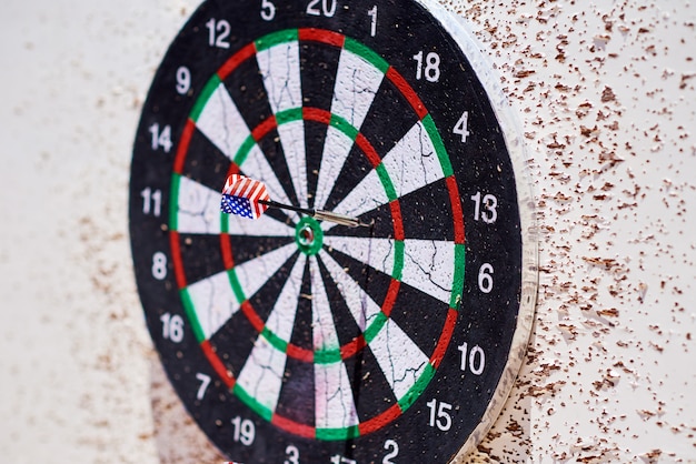 Photo dartboard with darts. hit group of target in a dart game