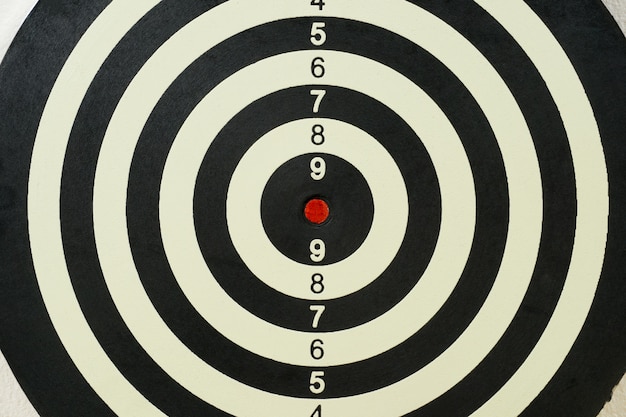 Dartboard with red target point in the center