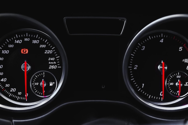 Dashboard met ronde snelheidsmeter in luxe sportwagen interieur voertuig achtergrondfoto