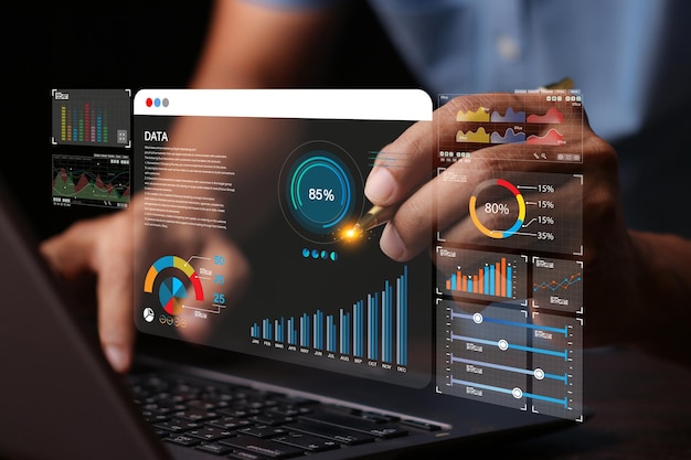 Data analyst working on business analytics dashboard with charts with KPI and metrics connected to the database for technology finance operations sales marketing