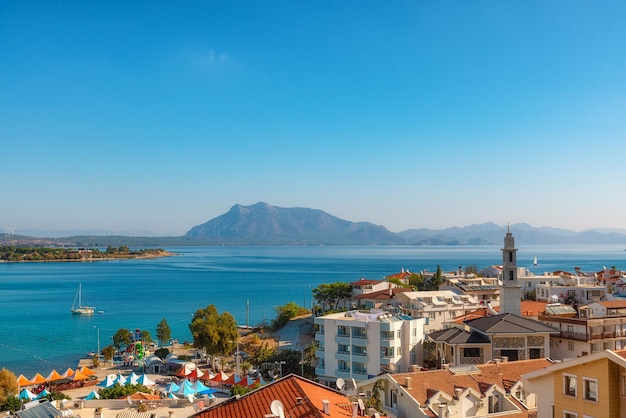 Datca town with harbour and island at sunny day Mugla province Turkey Popular tourist summer destination in Turkey