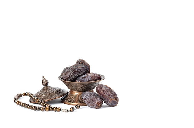 Dates on a bronze plate isolated