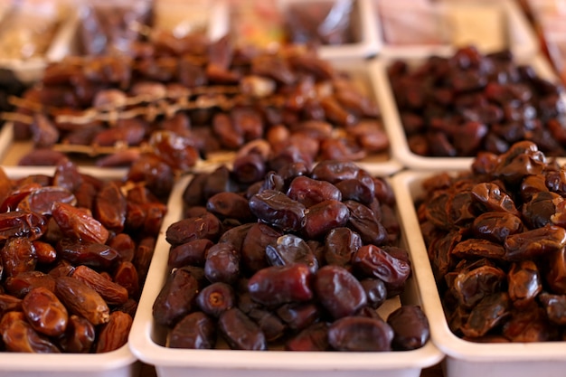 Dates, dried fruits, on the market counter.