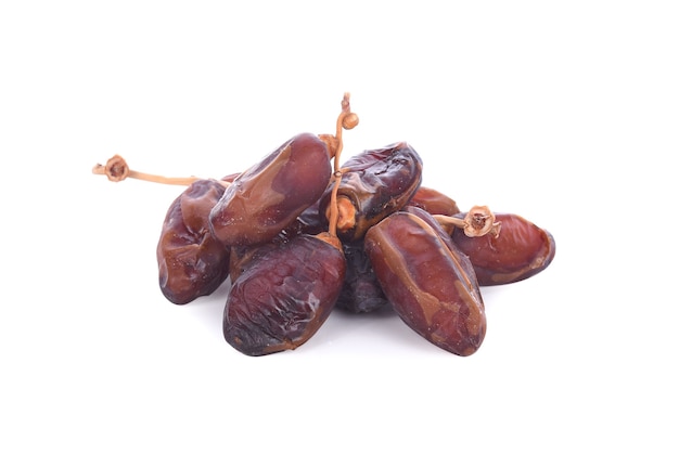 Dates fruit isolated on white surface