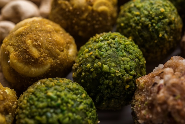 Dates oatmeal balls Or Dry Fruit Laddu in a plate of Gift box packing, selective focus