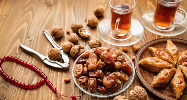 Dates rosaries and baklava Ramadan Selective focus