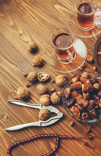 Dates, rosaries and baklava. Ramadan. Selective focus.