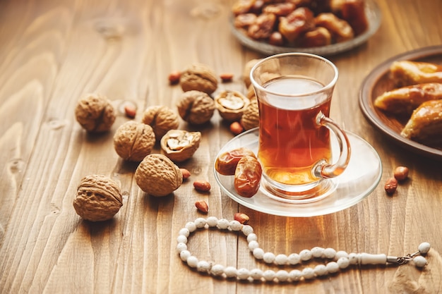 Dates, rosaries and baklava. ramadan. selective focus