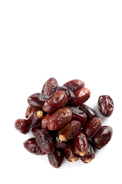 Photo dates on white surface. dried dates fruit.