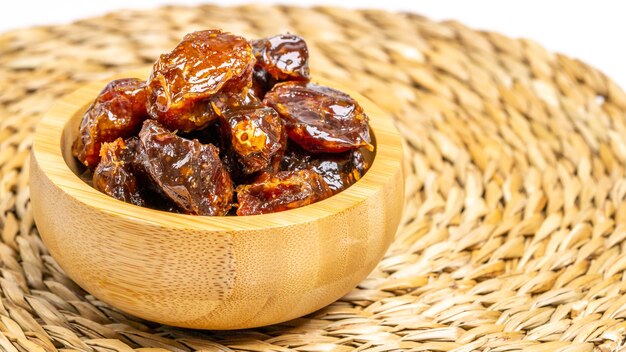 dates on a wooden bowl