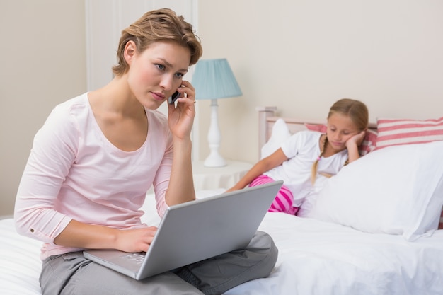 Daughter being ignored by busy mum