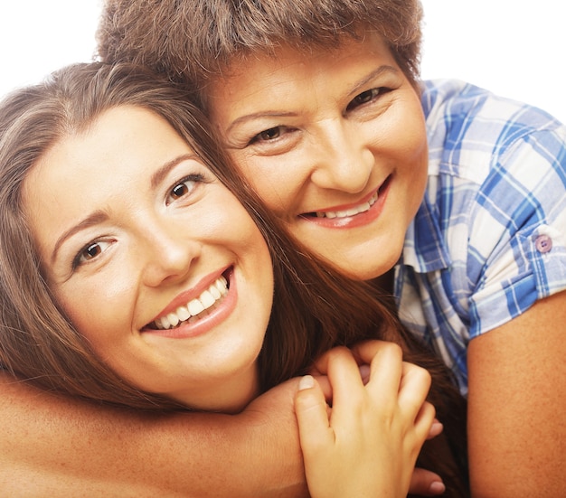 Daughter embracing her mother