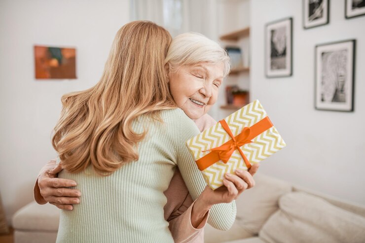 Daughter giving a hug to her beloved mother