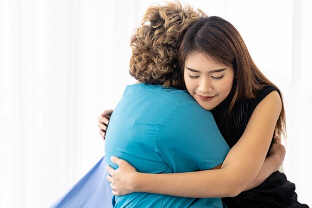 Daughter hug elderly mother