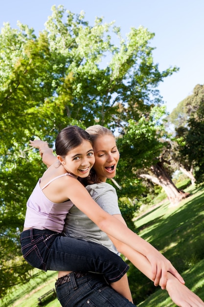 Daughter playing with her mother