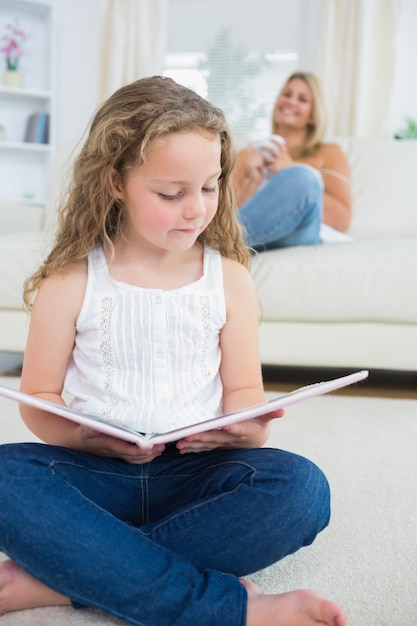 Daughter reading a book