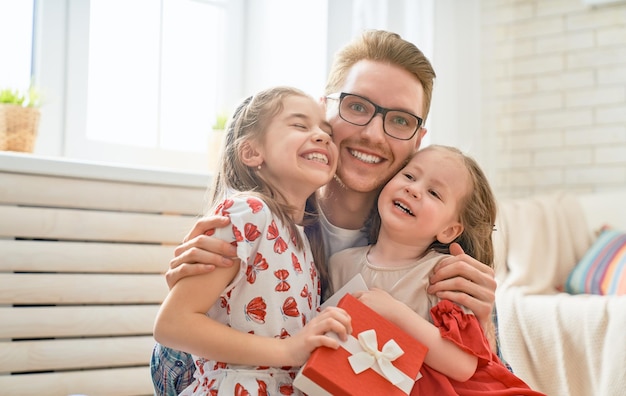 Daughters congratulating dad