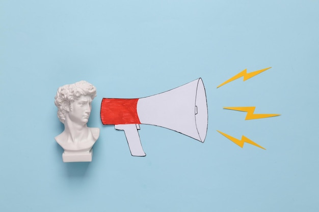 david bust with paper cut cartoon megaphone on blue background minimal layout concept pop