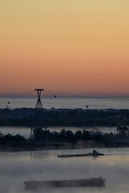 dawn over the cable car across the river