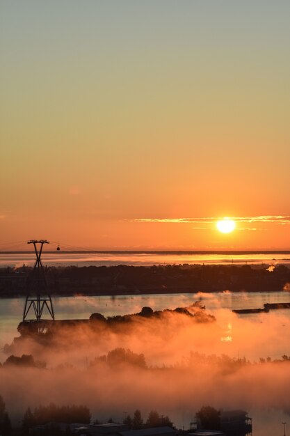 dawn over the cable car across the river