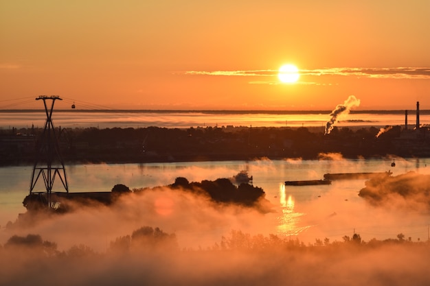 dawn over the cable car across the river