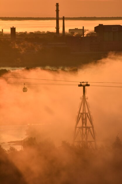 dawn over the cable car across the river