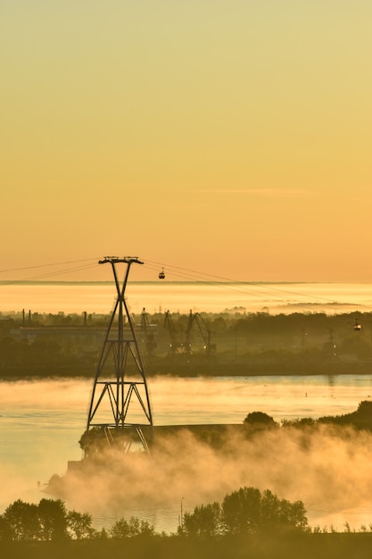 dawn over the cable car across the river