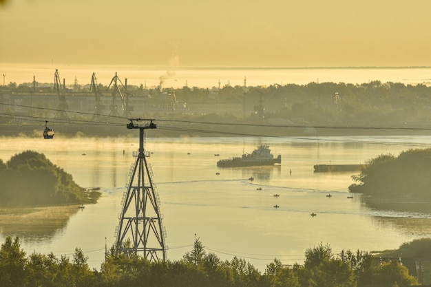 dawn over the cable car across the river