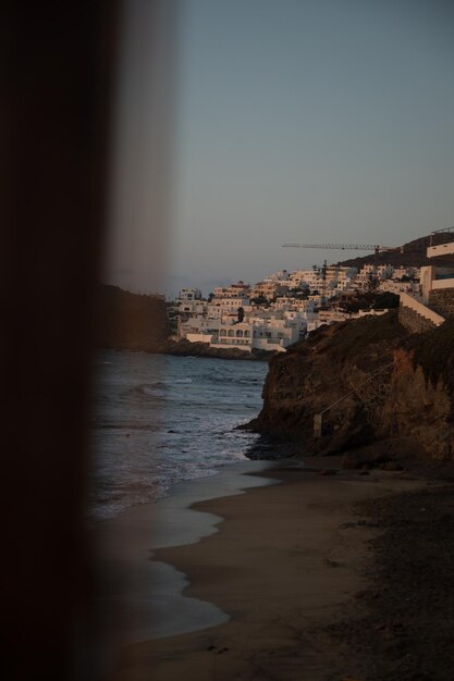 Dawn in a coastal town with white houses