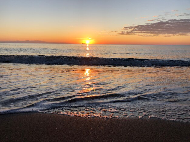 Dawn at sea sand beach Rhodes Greece