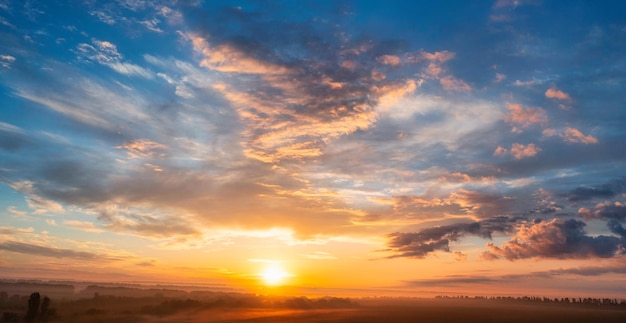 The dawn sky over the village A wonderful morning landscape