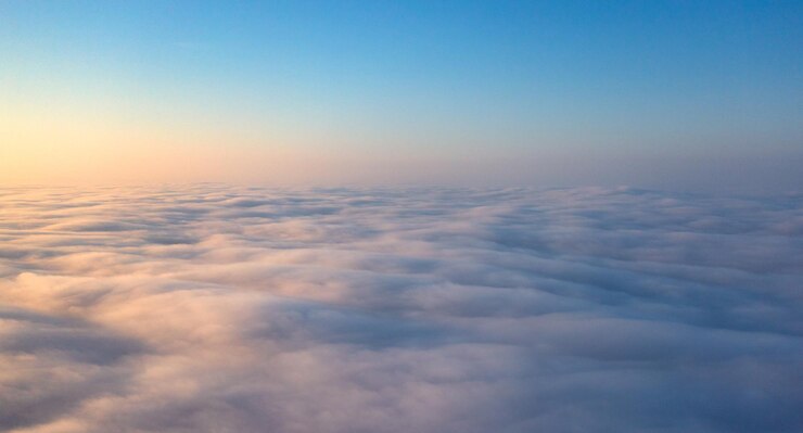 Dawns Awakening Illuminating the Sky Beyond the Cloud Veil