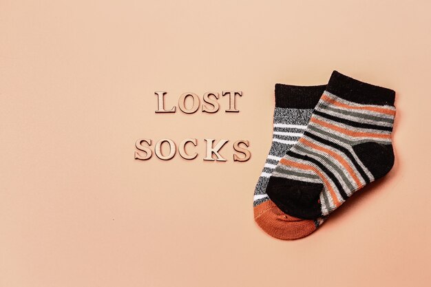 Day lost socks lonely socks on a beige background