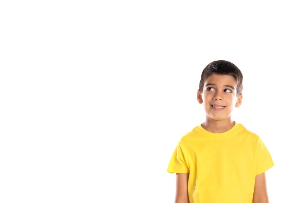 Daydreaming boy looking up isolated on a white background