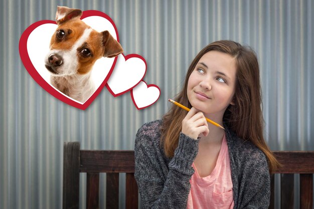 Photo daydreaming girl next to floating hearts with puppy within