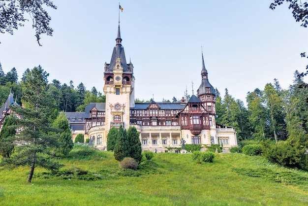 Daylight side far view to Peles castle in Romania