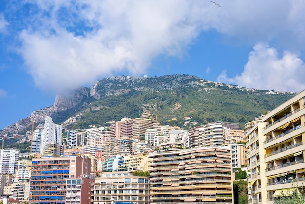 Daylight sunny view to city big buildings and mountains