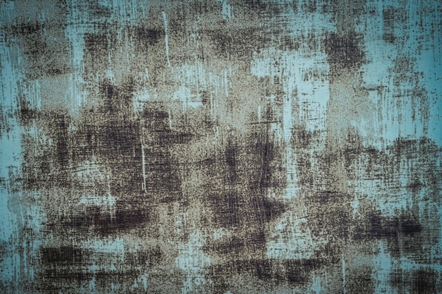 Foto de achtergrond van een oude ijzeren plaat blauw geverfd met roestvlekken