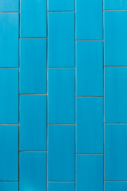 De blauwe achtergrond van de keramische tegelstextuur