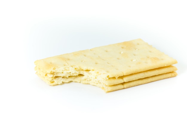 De crackers romen het vullen met sporen in etend op witte achtergrond
