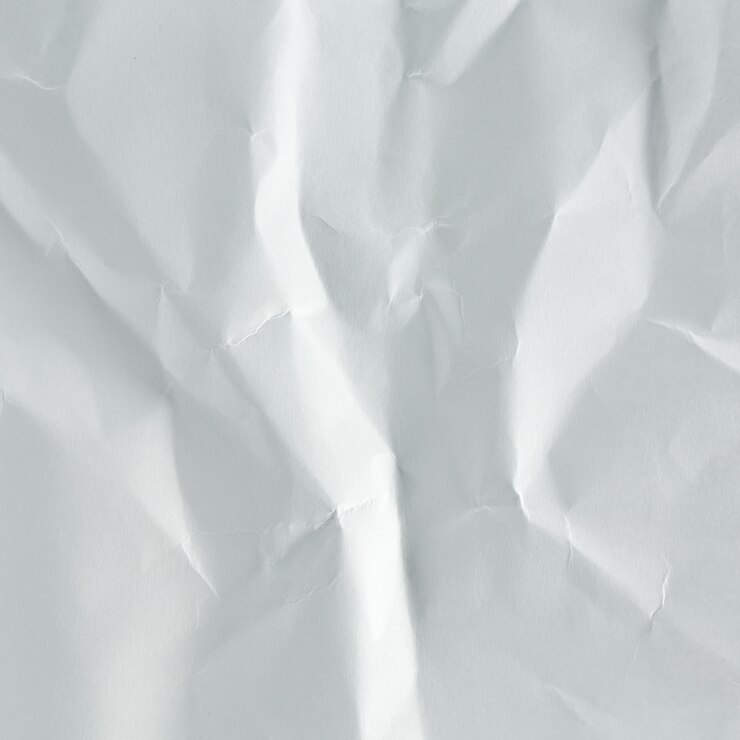 Foto de dichte omhooggaande achtergrond van het rimpel witboek