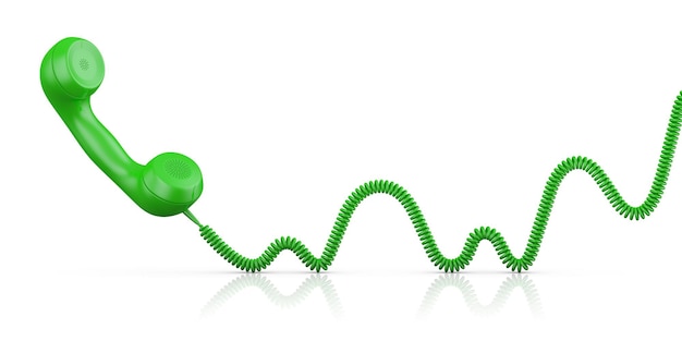 Foto de groene handset met een draad op een witte achtergrond. 3d-weergave.