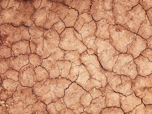 Foto de grond heeft scheuren in het bovenaanzicht voor de achtergrond