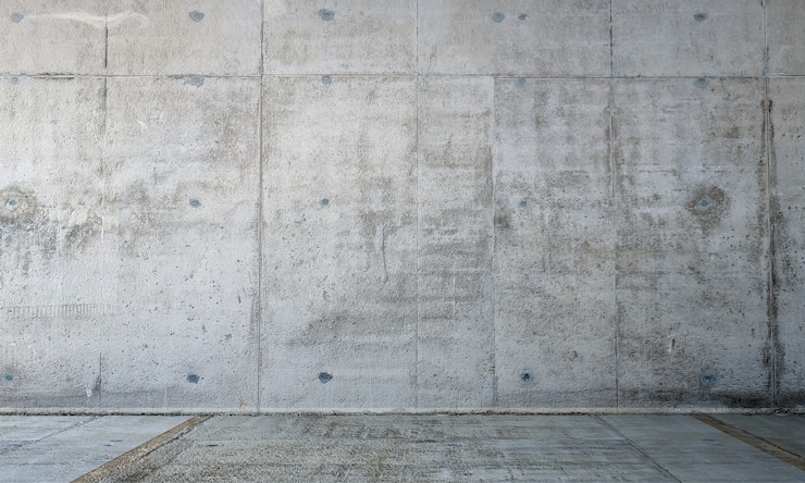 De lege moderne woonkamer en mock-up meubeldecoratie en betonnen muurachtergrond
