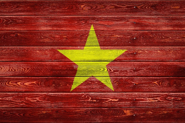 De nationale vlag van VietnamxA is geschilderd op een kamp van even planken genageld met een spijker Het symbool van het land