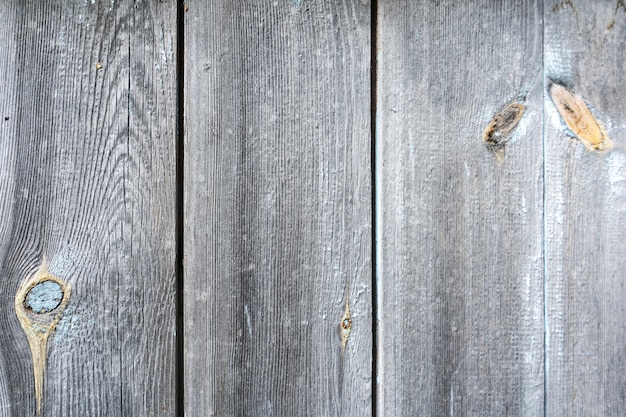 De oude houten raad van de omheinings rotte textuur. Achtergrond